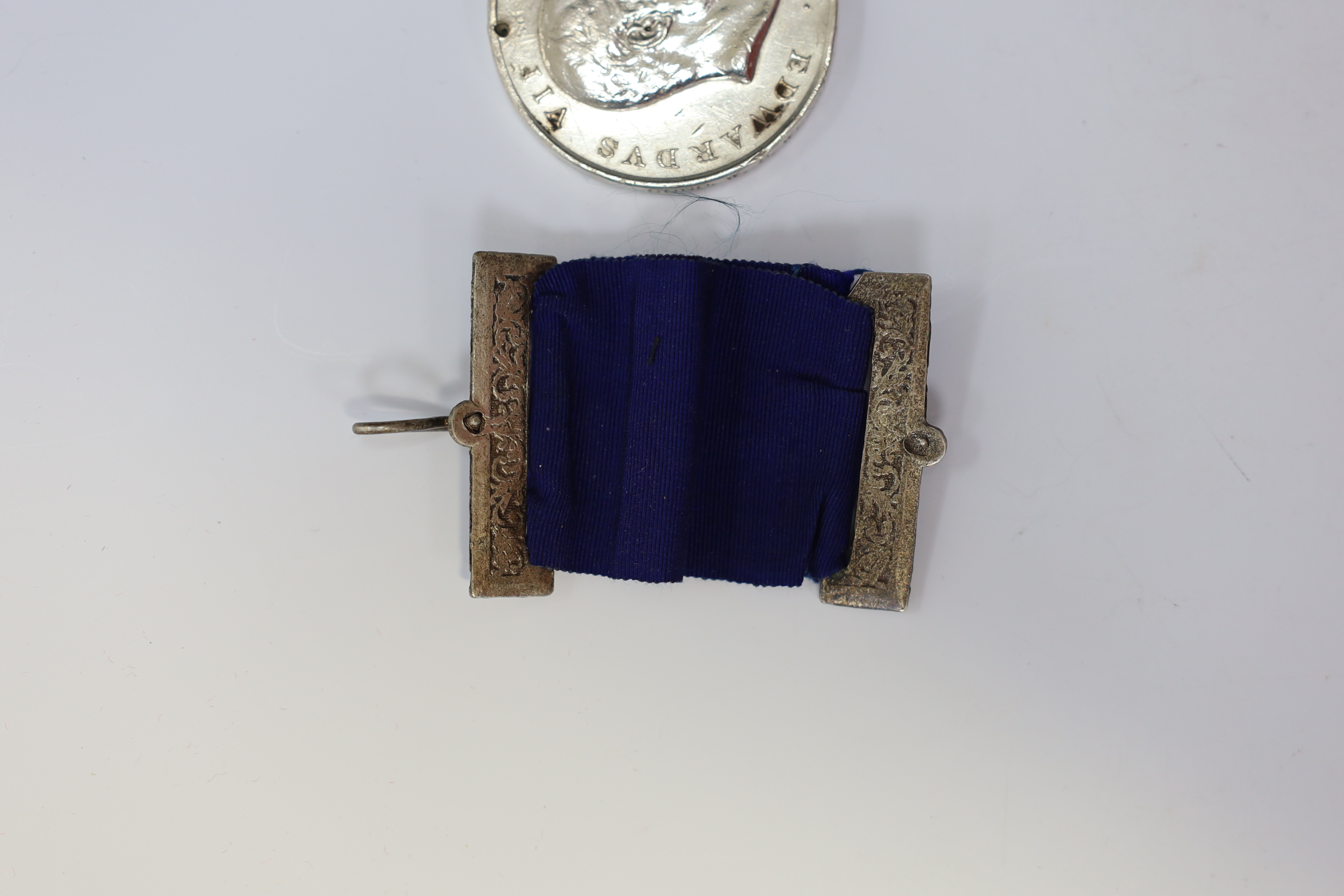 A Natal Rebellion Medal to Cond. W.S.Wearne, Militia. Trans. Service, disc with associated suspension bar